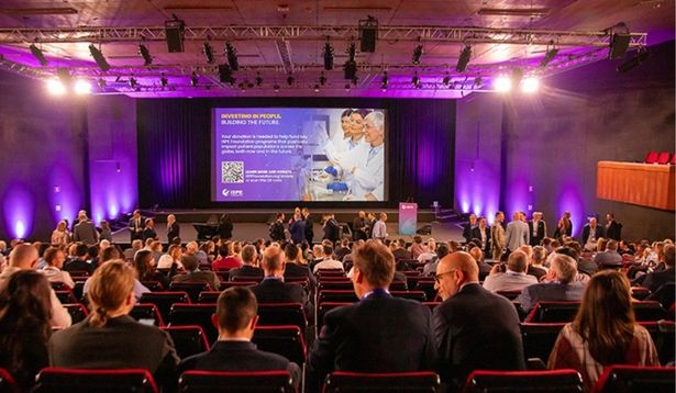 audience in a theater watching a presentation at the ISPE Europe Annual Conference